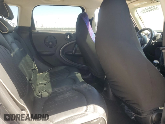 2013 MINI Countryman S ALL4 with VIN WMWZC5C50DWM15256, listed as a Copart auction lot 58080895 with 123,514 mi miles and Salvage title. Bid and sale history available at DreamBid. Image 10.