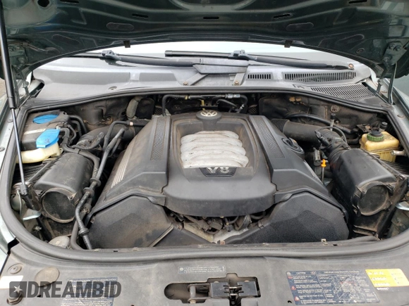 2006 Volkswagen Touareg 4.2L V8 z VIN WVGZM77L16D049631, wystawiony jako Copart lot #84882844 z przebiegiem Nie podano mil oraz Szkoda całkowita • Salvage title. Historia ofert i sprzedaży dostępna na DreamBid. Obrazek 12.