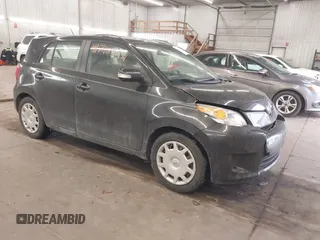 2011 Scion xD with VIN JTKKU4B48B1012679, listed as a IAAI auction lot 41710522 with 188,084 mi miles. Bid and sale history available at carsss.com. Image 1.