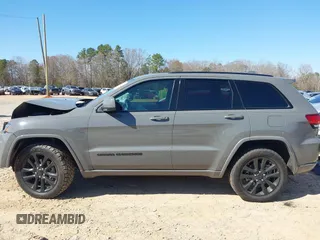 2019 Jeep Grand Cherokee Laredo E with VIN 1C4RJFAG2KC855108, listed as a IAAI auction lot 41780277 with 81,283 mi miles and . Bid and sale history available at DreamBid. Image 15.