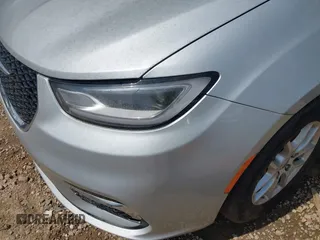 2023 Chrysler Pacifica Touring L with VIN 2C4RC1BG7PR521232, listed as a IAAI auction lot 42087909 with 34,609 mi miles and . Bid and sale history available at DreamBid. Image 6.