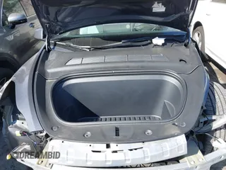 2023 Tesla Model Y Performance z VIN 7SAYGDEF6PF774965, wystawiony jako IAAI lot #41655550 z przebiegiem 33 824 mil mil oraz . Historia ofert i sprzedaży dostępna na DreamBid. Obrazek 10.