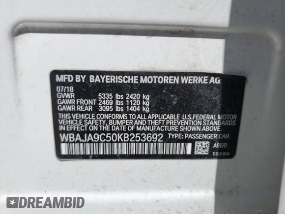 2019 BMW 5 Series 530e with VIN WBAJA9C50KB253692, listed as a Copart auction lot 52568095 with 61,023 mi miles and Salvage title. Bid and sale history available at DreamBid. Image 12.