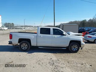 2015 Chevrolet Silverado 1500 LT with VIN 3GCPCREH3FG125975, listed as a IAAI auction lot 41459150 with 217,012 mi miles and . Bid and sale history available at DreamBid. Image 13.
