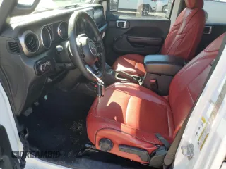 2018 Jeep Wrangler Unlimited Sport S with VIN 1C4HJXDN4JW240844, listed as a Copart auction lot 55578405 with 70,369 mi miles and Salvage title. Bid and sale history available at DreamBid. Image 7.