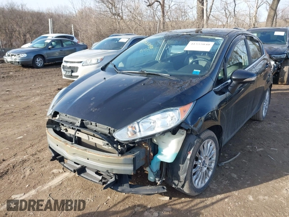 2014 Ford Fiesta Titanium z VIN 3FADP4FJXEM127644, wystawiony jako IAAI lot #41555040 z przebiegiem 107 046 mil mil oraz . Historia ofert i sprzedaży dostępna na DreamBid. Obrazek 18.