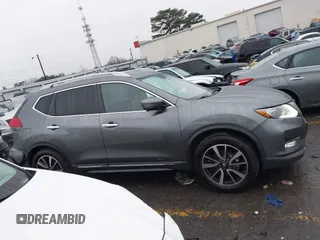 2019 Nissan Rogue SL with VIN 5N1AT2MT4KC784661, listed as a IAAI auction lot 41426525 with 149,273 mi miles and . Bid and sale history available at DreamBid. Image 13.