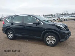 2015 Honda CR-V LX with VIN 2HKRM3H35FH501019, listed as a IAAI auction lot 41014683 with 111,168 mi miles and . Bid and sale history available at carsss.com. Image 13.
