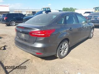 2017 Ford Focus SE with VIN 1FADP3F22HL341553, listed as a IAAI auction lot 42305588 with 165,016 mi miles and . Bid and sale history available at DreamBid. Image 4.
