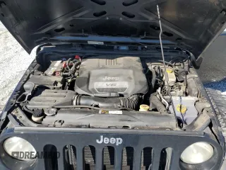 2014 Jeep Wrangler Unlimited Sport with VIN 1C4BJWDG9EL250326, listed as a Copart auction lot 48545705 with 247,460 mi miles and Salvage Title. Bid and sale history available at DreamBid. Image 14.