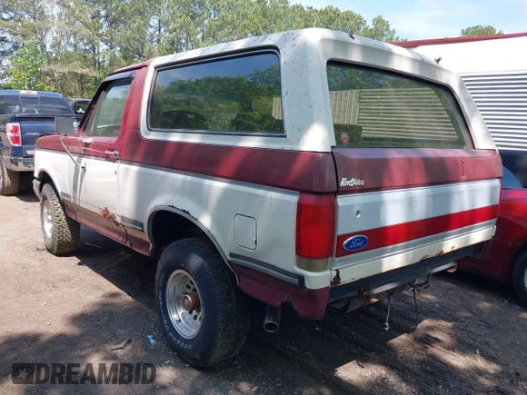 1989 Ford Bronco XL with VIN 1FMEU15N8KLB48656, listed as a IAAI auction lot 42142524 with 87,459 mi miles. Bid and sale history available at carsss.com. Image 3.