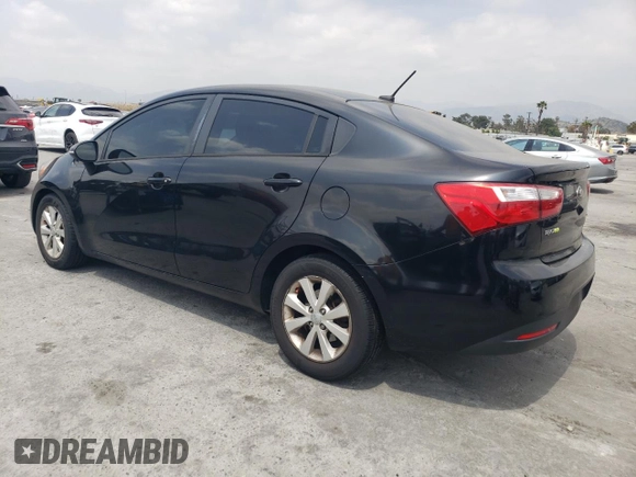 2014 Kia Rio EX z VIN KNADN4A3XE6377570, wystawiony jako Copart lot #54705705 z przebiegiem 63 982 mil mil oraz Tytuł czysty. Historia ofert i sprzedaży dostępna na DreamBid. Obrazek 2.
