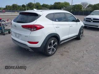 2018 Hyundai Tucson Sport with VIN KM8J33AL5JU691991, listed as a IAAI auction lot 41817480 with 89,129 mi miles. Bid and sale history available at carsss.com. Image 4.