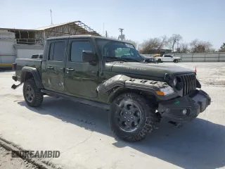 2023 Jeep Gladiator Freedom with VIN 1C6HJTAG9PL543165, listed as a Copart auction lot 47761235 with 43,614 mi miles and Salvage title. Bid and sale history available at DreamBid. Image 4.
