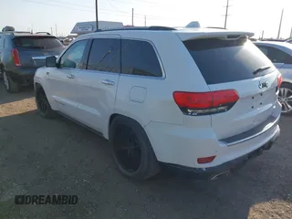2015 Jeep Grand Cherokee Summit with VIN 1C4RJFJT5FC767687, listed as a IAAI auction lot 42015878 with 1 mi miles. Bid and sale history available at carsss.com. Image 3.