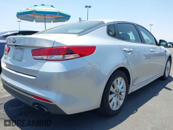 2018 Kia Optima LX with VIN 5XXGT4L35JG266892, listed as a IAAI auction lot 42473938 with 79,690 mi miles and . Bid and sale history available at DreamBid. Image 4.
