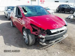2020 Tesla Model Y Long Range with VIN 5YJYGDEE9LF009957, listed as a IAAI auction lot 41780248 with 31,053 mi miles and . Bid and sale history available at DreamBid. Image 6.