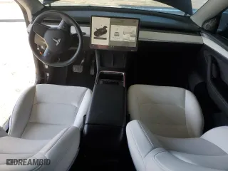 2023 Tesla Model Y Long Range with VIN 7SAYGDEE3PF938230, listed as a Copart auction lot 47883385 with 28,461 mi miles and Salvage Title. Bid and sale history available at carsss.com. Image 8.