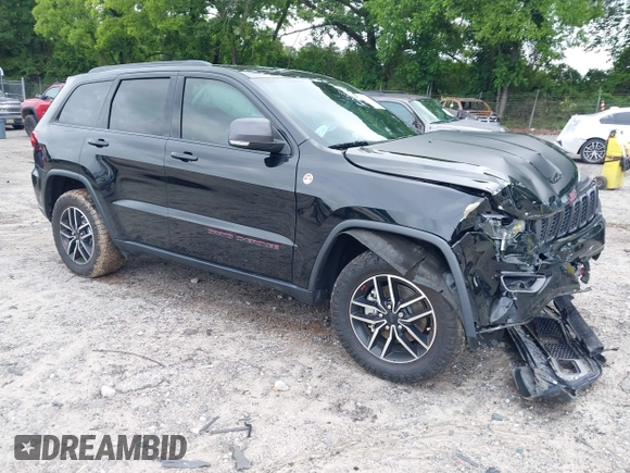2020 Jeep Grand Cherokee Trailhawk with VIN 1C4RJFLG4LC387459, listed as a IAAI auction lot 42373820 with 55,492 mi miles and . Bid and sale history available at DreamBid. Image 1.