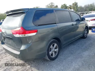 2014 Toyota Sienna L with VIN 5TDZK3DC6ES421278, listed as a IAAI auction lot 41178679 with 202,823 mi miles. Bid and sale history available at carsss.com. Image 4.