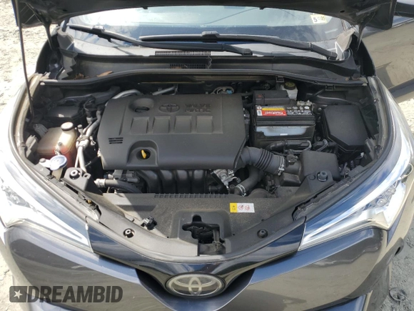 2018 Toyota C-HR XLE z VIN JTNKHMBX2J1003394, wystawiony jako Copart lot #58234865 z przebiegiem 132 574 mil mil oraz Szkoda całkowita • Salvage title. Historia ofert i sprzedaży dostępna na DreamBid. Obrazek 11.