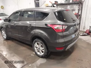2017 Ford Escape SE z VIN 1FMCU9GD6HUC10553, wystawiony jako IAAI lot #42174098 z przebiegiem 101 243 mil mil oraz . Historia ofert i sprzedaży dostępna na DreamBid. Obrazek 3.