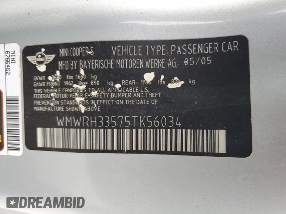 2005 MINI Convertible S with VIN WMWRH33575TK56034, listed as a Copart auction lot 88043565 with 33,410 mi miles and Salvage title. Bid and sale history available at DreamBid. Image 12.