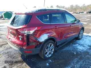 2014 Ford Escape SE with VIN 1FMCU0GX6EUA57609, listed as a IAAI auction lot 41533589 with 96,709 mi miles. Bid and sale history available at carsss.com. Image 4.