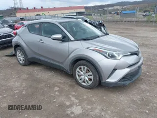 2019 Toyota C-HR XLE with VIN NMTKHMBX7KR079751, listed as a IAAI auction lot 42013399 with 74,665 mi miles. Bid and sale history available at carsss.com. Image 1.