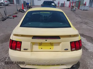2003 Ford Mustang GT Deluxe z VIN 1FAFP42X43F394679, wystawiony jako IAAI lot #42129223 z przebiegiem 135 472 mil mil oraz . Historia ofert i sprzedaży dostępna na DreamBid. Obrazek 17.