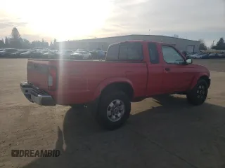 1999 Nissan Frontier XE with VIN 1N6ED26Y2XC312863, listed as a Copart auction lot 42259015 with 212,666 mi miles and Salvage title. Bid and sale history available at DreamBid. Image 3.