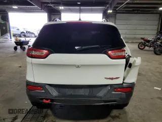 2016 Jeep Cherokee Trailhawk with VIN 1C4PJMBS8GW166629, listed as a Copart auction lot 55845415 with 122,290 mi miles and Salvage title. Bid and sale history available at DreamBid. Image 6.