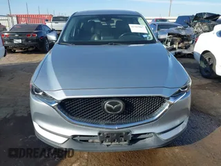 2020 Mazda CX-5 Touring with VIN JM3KFACM1L0789394, listed as a IAAI auction lot 41565887 with 73,730 mi miles. Bid and sale history available at carsss.com. Image 13.