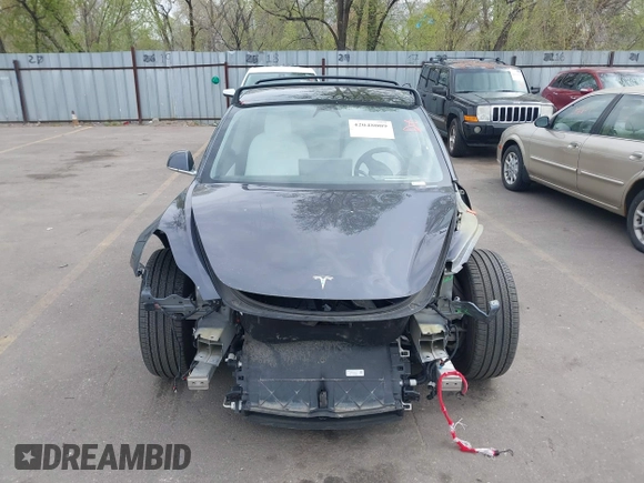 2020 Tesla Model 3 Long Range with VIN 5YJ3E1EB1LF639055, listed as a IAAI auction lot 42048009 with 43,493 mi miles. Bid and sale history available at carsss.com. Image 12.