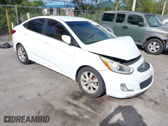2014 Hyundai Accent GLS with VIN KMHCU4AE8EU608539, listed as a IAAI auction lot 41946784 with 106,709 mi miles and . Bid and sale history available at carsss.com. Image 1.