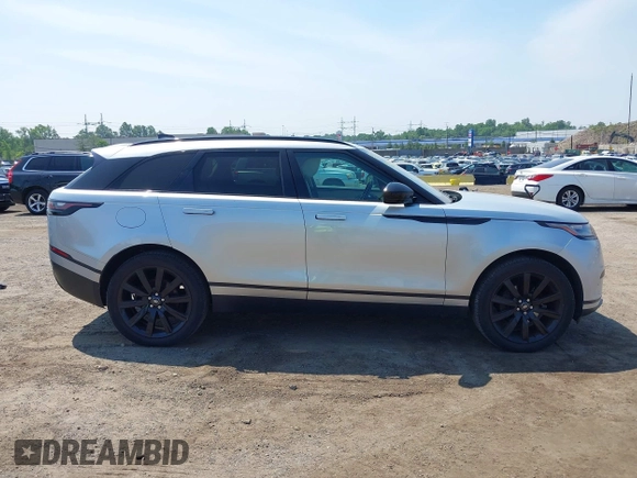2020 Land Rover Range Rover Velar S z VIN SALYB2EX4LA242330, wystawiony jako IAAI lot #42479335 z przebiegiem 99 712 mil mil oraz . Historia ofert i sprzedaży dostępna na DreamBid. Obrazek 13.