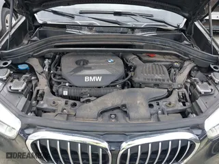 2018 BMW X1 xDrive28i with VIN WBXHT3C34J5K21576, listed as a IAAI auction lot 41822390 with 69,645 mi miles. Bid and sale history available at carsss.com. Image 10.