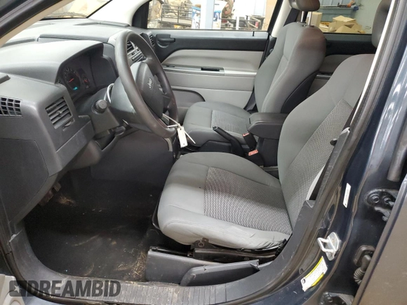 2007 Jeep Compass Sport with VIN 1J8FF47W87D130159, listed as a Copart auction lot 47032565 with 161,236 mi miles and Salvage Title. Bid and sale history available at carsss.com. Image 7.