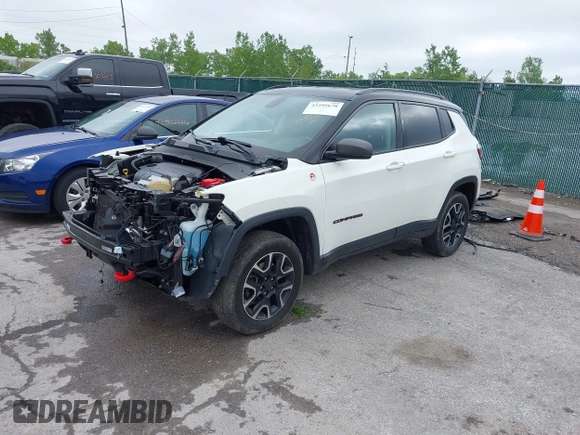 2020 Jeep Compass Trailhawk z VIN 3C4NJDDB8LT195584, wystawiony jako IAAI lot #42295678 z przebiegiem 99 762 mil mil oraz . Historia ofert i sprzedaży dostępna na DreamBid. Obrazek 18.