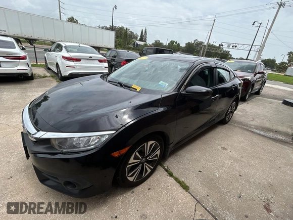 2017 Honda Civic EX-L с VIN 19XFC1F76HE013074, выставлен на аукционе Copart как лот 60144655 с пробегом 121 493 миль миль и Чистый • Clean title. История ставок и продаж доступна на DreamBid. Изображение 2.