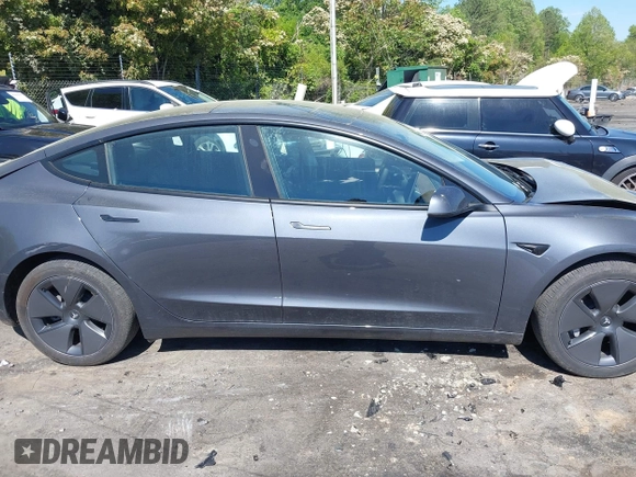 2023 Tesla Model 3 with VIN 5YJ3E1EA6PF645110, listed as a IAAI auction lot 42044357 with 24,352 mi miles and . Bid and sale history available at DreamBid. Image 13.