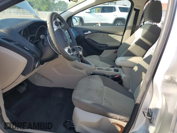 2013 Ford Focus SE with VIN 1FADP3F20DL142026, listed as a Copart auction lot 61855025 with 148,851 mi miles and Salvage title. Bid and sale history available at DreamBid. Image 7.