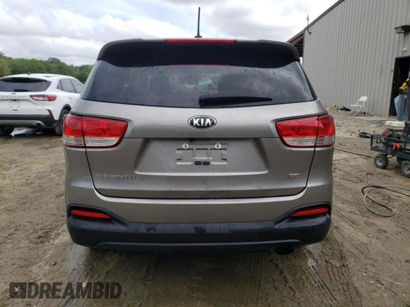 2018 Kia Sorento LX z VIN 5XYPG4A31JG345348, wystawiony jako Copart lot #55413455 z przebiegiem 64 868 mil mil oraz Szkoda całkowita • Salvage title. Historia ofert i sprzedaży dostępna na DreamBid. Obrazek 6.