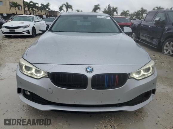 2015 BMW 4 Series 428i xDrive с VIN WBA4C9C59FD330853, выставлен на аукционе Copart как лот 52130785 с пробегом 128 618 миль миль и Списание • Salvage title. История ставок и продаж доступна на DreamBid. Изображение 5.