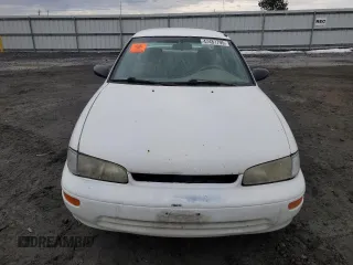 1996 Geo Prizm z VIN 1Y1SK5266TZ039172, wystawiony jako Copart lot #47487795 z przebiegiem 358 307 mil mil oraz Tytuł czysty. Historia ofert i sprzedaży dostępna na DreamBid. Obrazek 5.