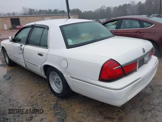 2001 Mercury Grand Marquis LS with VIN 2MEFM75W41X672360, listed as a IAAI auction lot 41418594 with 73,717 mi miles and . Bid and sale history available at DreamBid. Image 3.