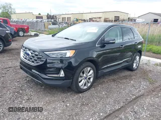 2020 Ford Edge Titanium with VIN 2FMPK4K94LBA22657, listed as a IAAI auction lot 42340706 with 62,857 mi miles and . Bid and sale history available at DreamBid. Image 18.