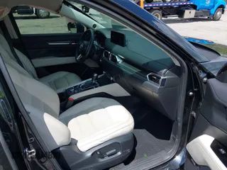 2023 Mazda CX-5 2.5 S Premium Plus Package with VIN JM3KFBEM5P0256652, listed as a IAAI auction lot 41936376 with 31,332 mi miles. Bid and sale history available at carsss.com. Image 5.