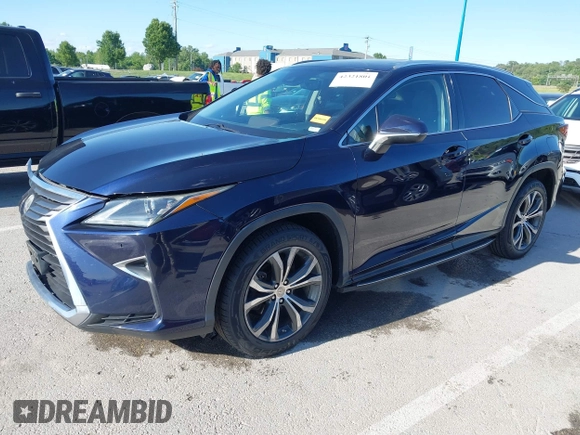 2016 Lexus RX 350 with VIN 2T2BZMCA4GC046615, listed as a IAAI auction lot 42321801 with 110,820 mi miles and . Bid and sale history available at DreamBid. Image 2.