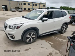 2020 Subaru Forester Touring with VIN JF2SKAXC3LH431111, listed as a Copart auction lot 60539515 with 88,853 mi miles and Salvage title. Bid and sale history available at DreamBid. Image 1.